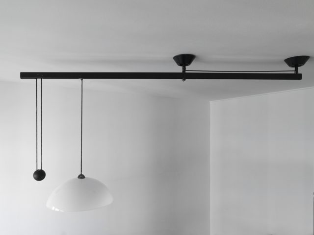 “Impiccato” counterweight ceiling lamp for Artemide