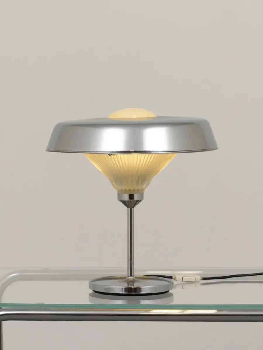 bbpr ro artemide 1963, lamp lit — warm glow through ribbed pressed glass cone diffuser 