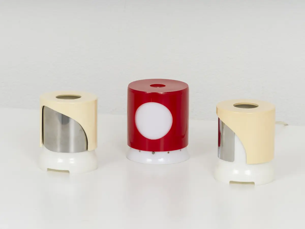 group of collectible italian space age table lamps, joe colombo for kartell,1964, cream and red perspex 