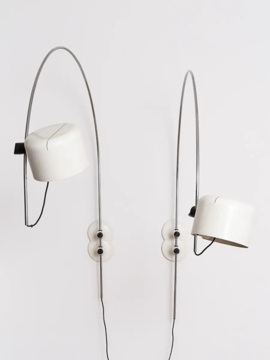 pair of joe colombo “coupé” arc wall lamps for o luce, designed 1967, white cylindrical shades and chromed steel arcs 
